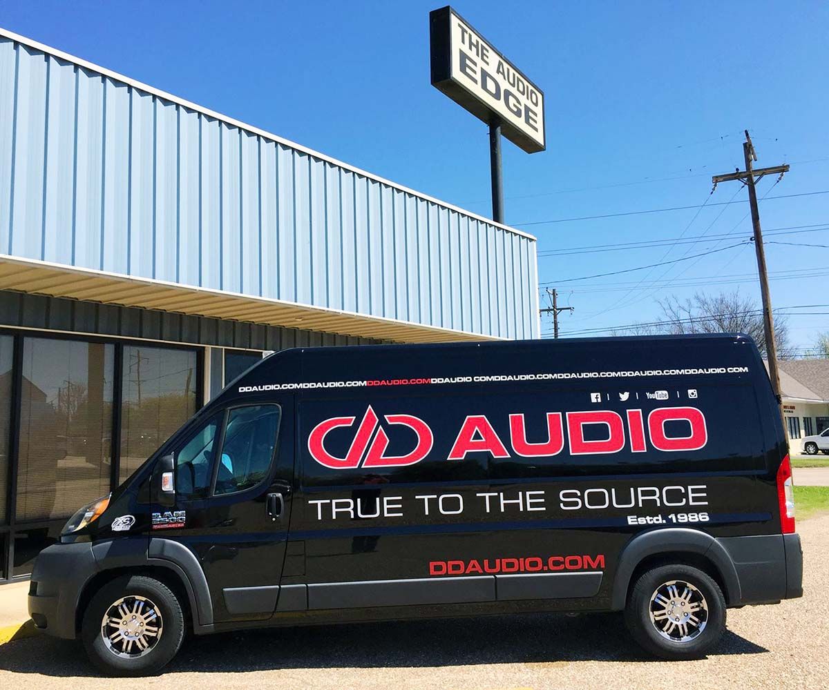 Photo of DD AUDIO van in front of Audio Edge storefront