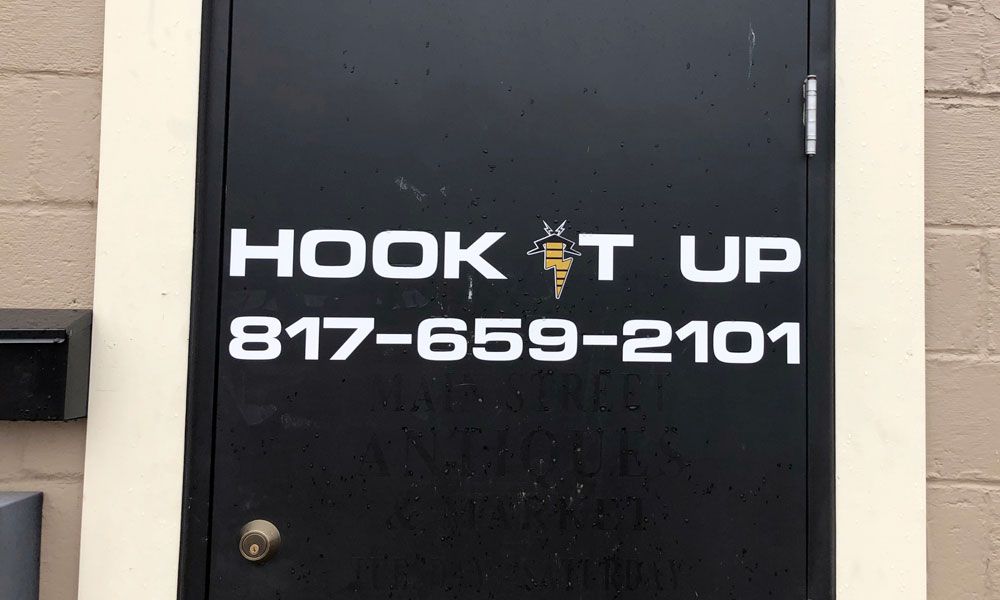Hook it up sign with logo and phone number 817-659-2101