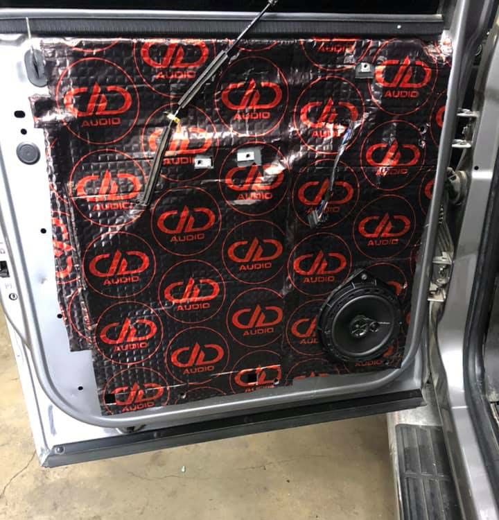 Photo of door with DD Energy Attenuation mat from G's Audio