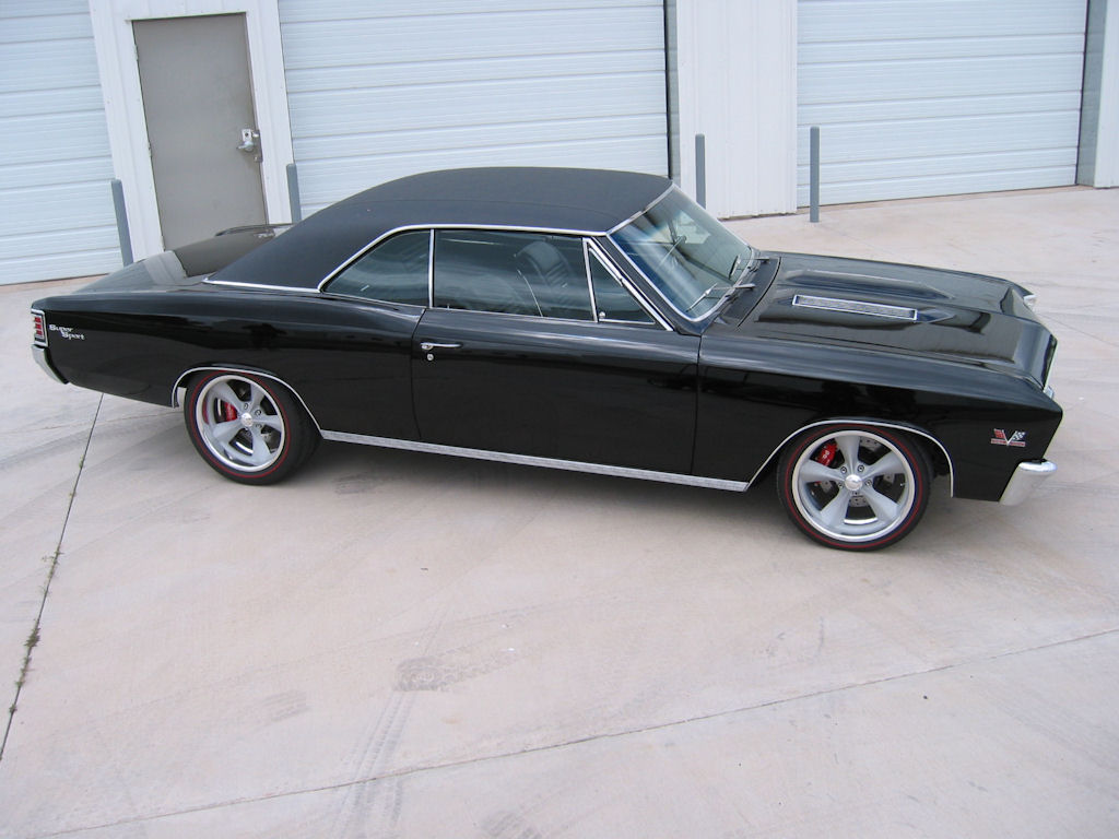 Photo of 67 Chevelle Black in back of Covington Customs shop